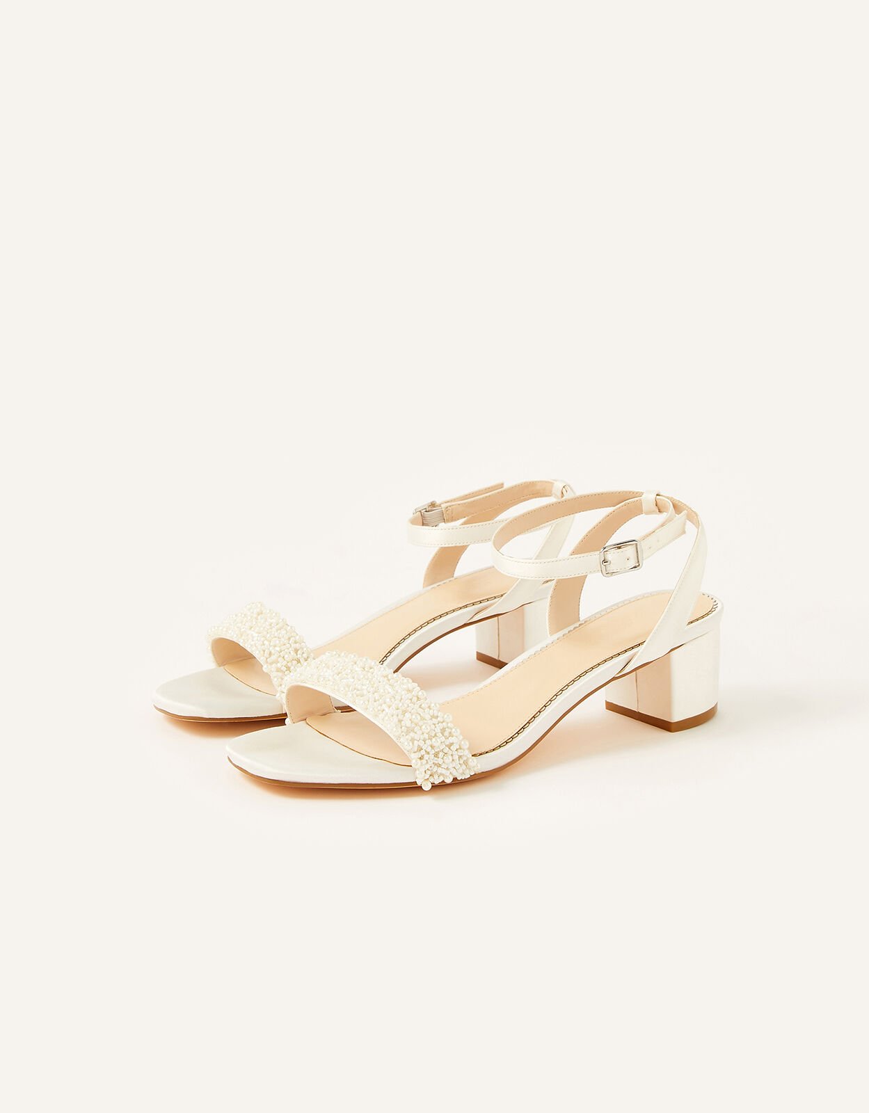 Ivory low heels sales