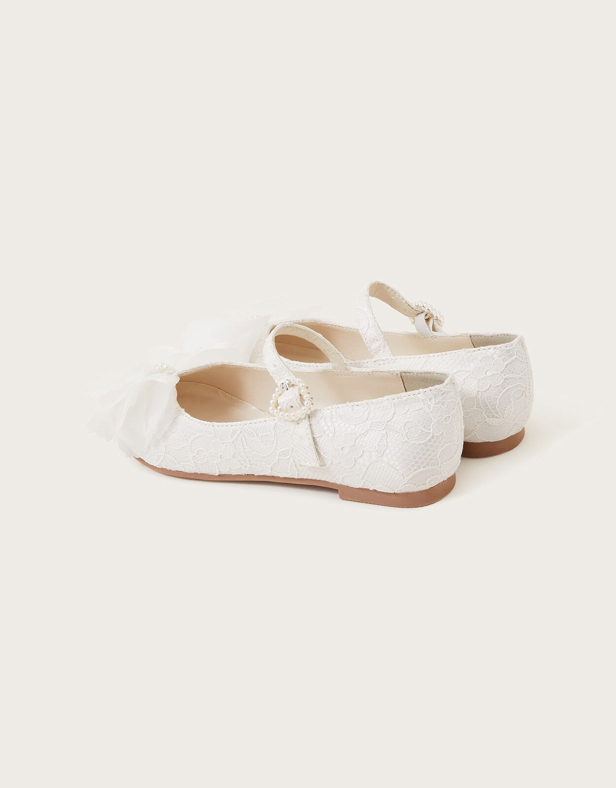 Monsoon communion shoes store
