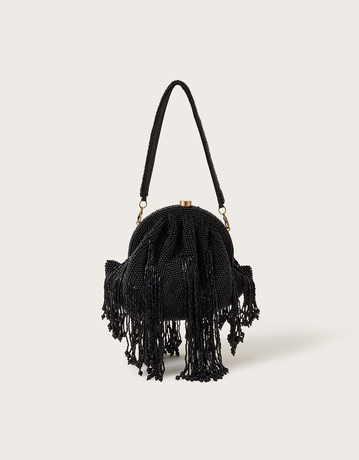 Black purse with sale tassels
