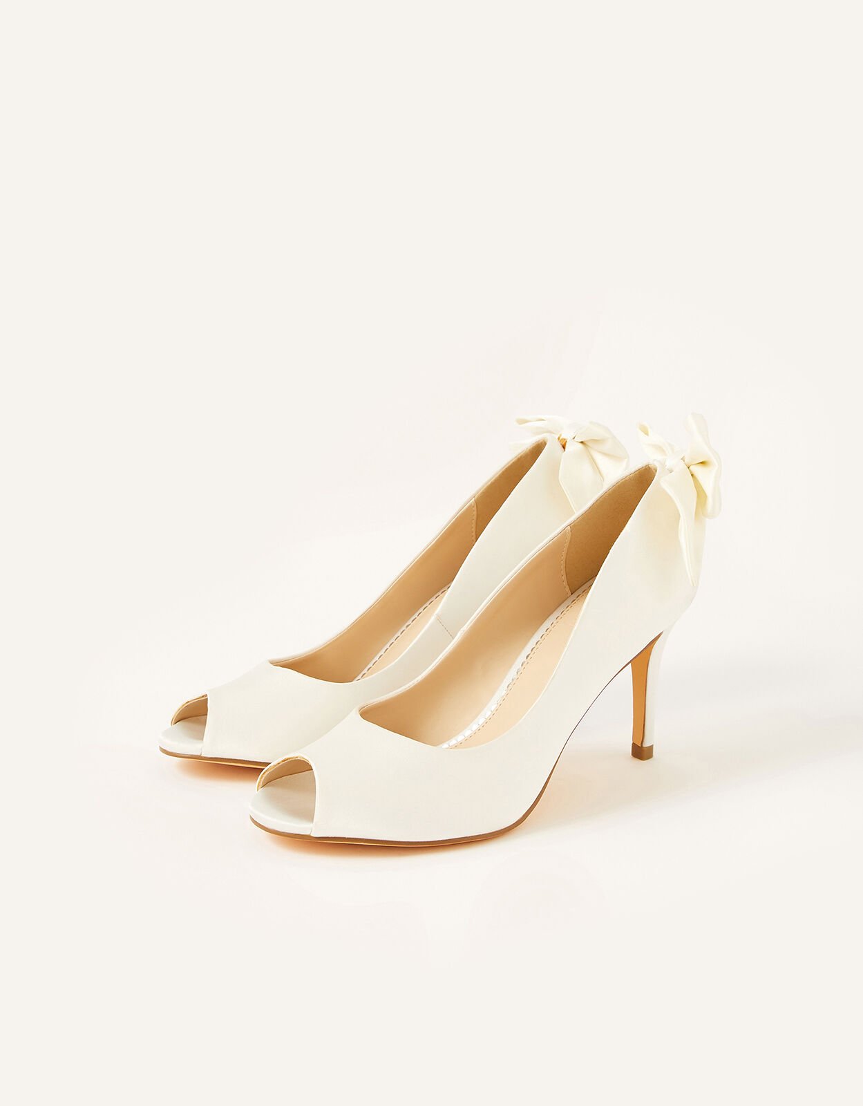 Ivory heels shop with bow