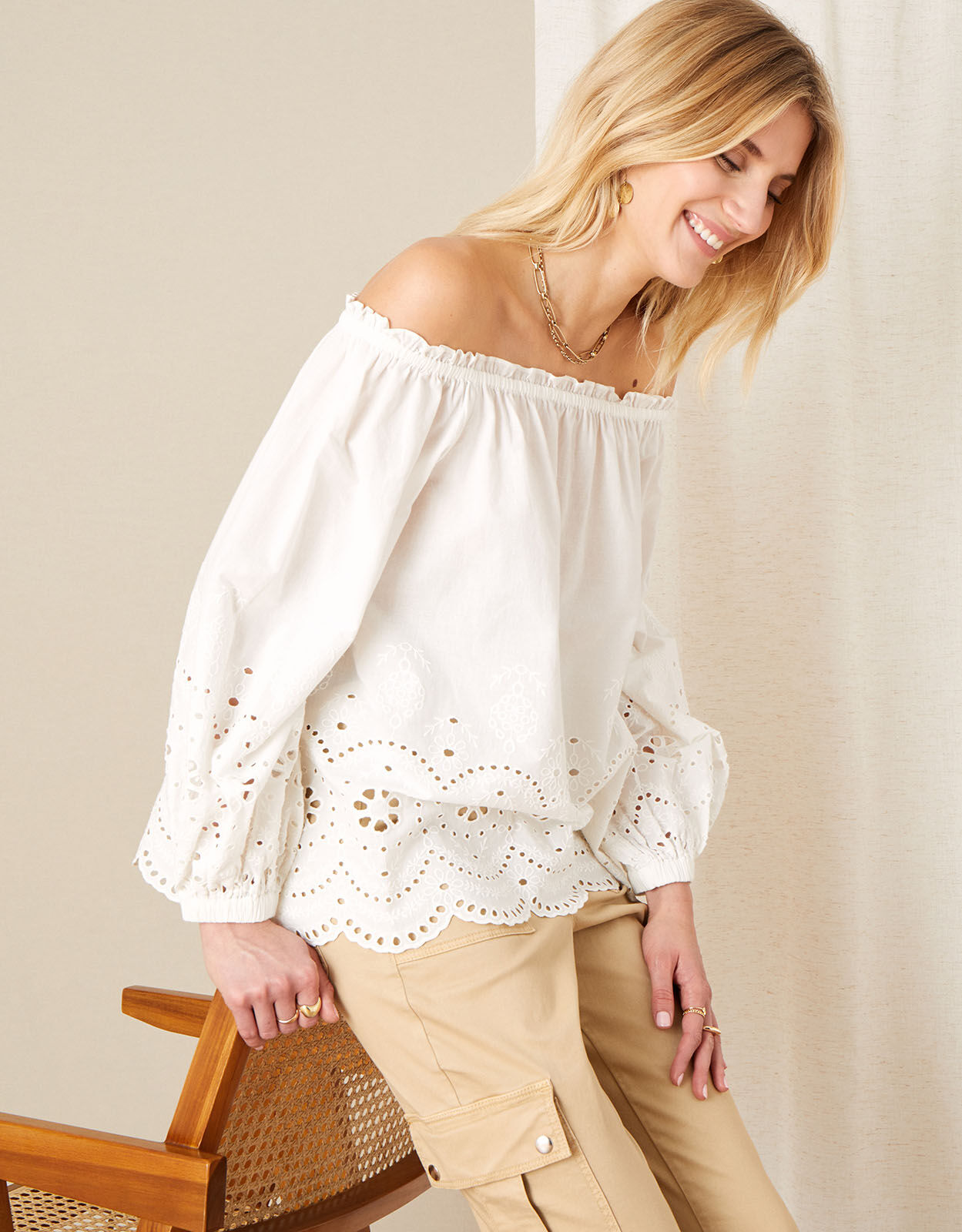 white shoulderless top