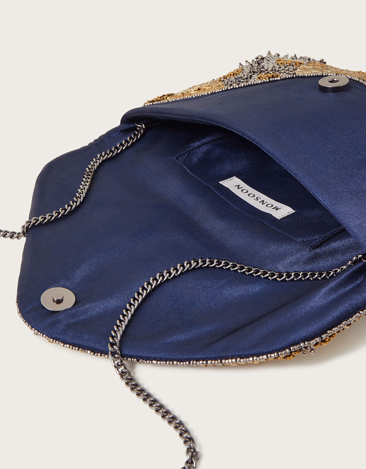Monsoon navy clutch bag new arrivals