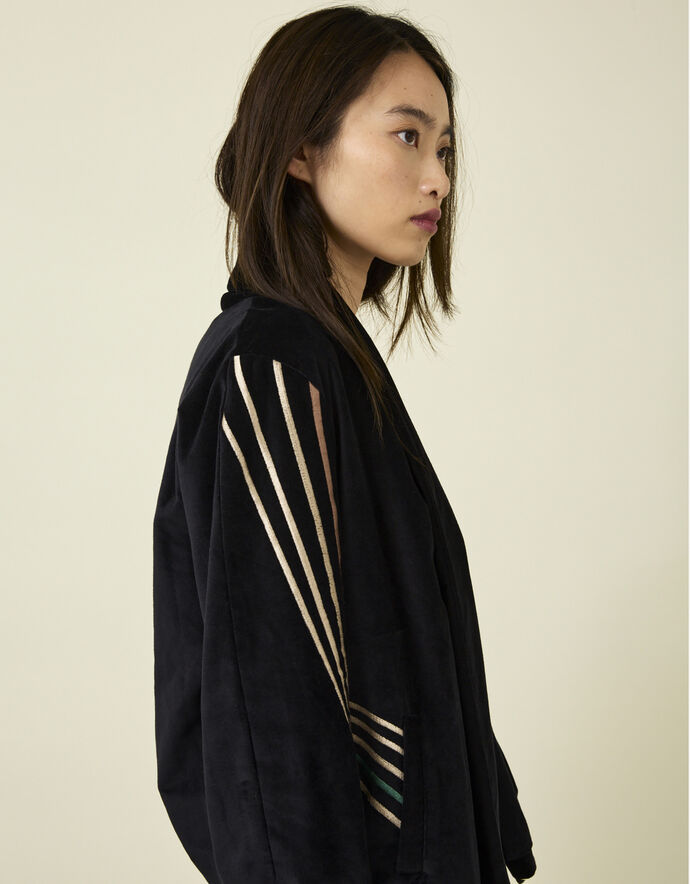 Believe In Miracles Smocked Velvet Top In Black