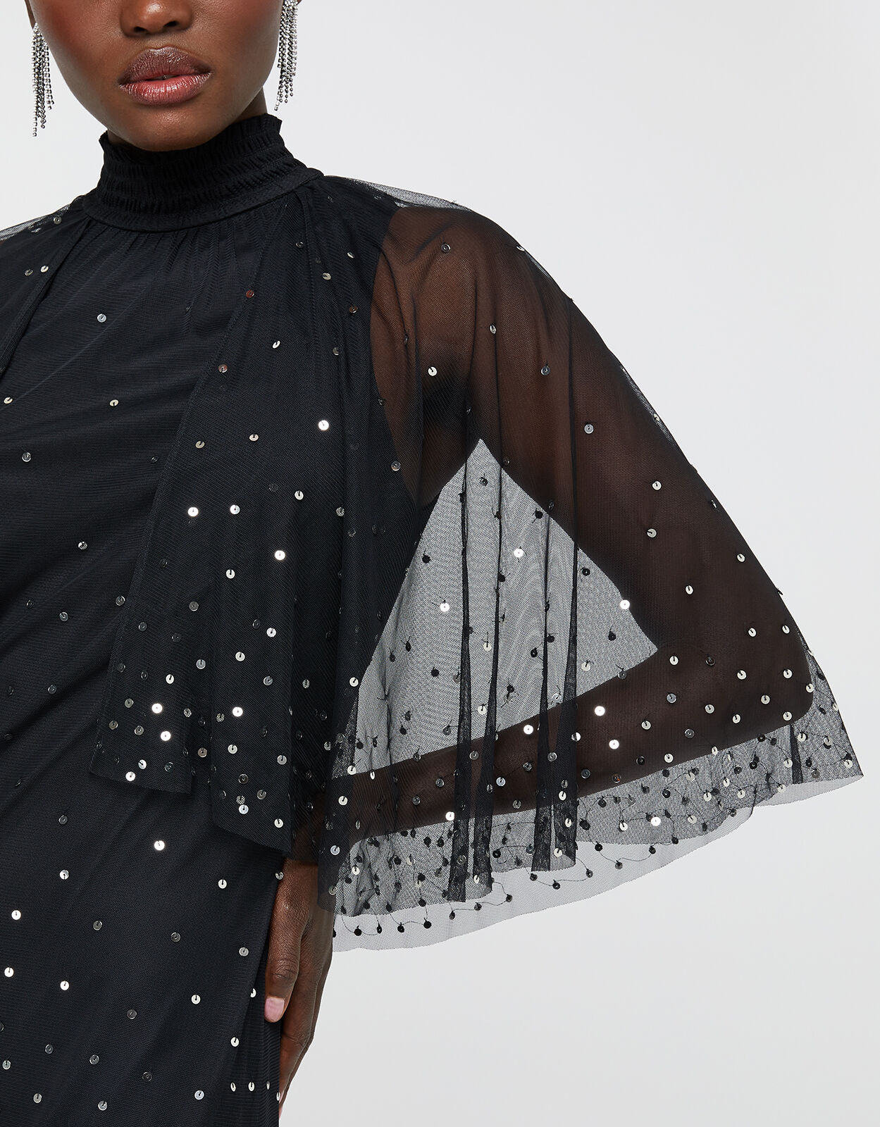cape sequin dress
