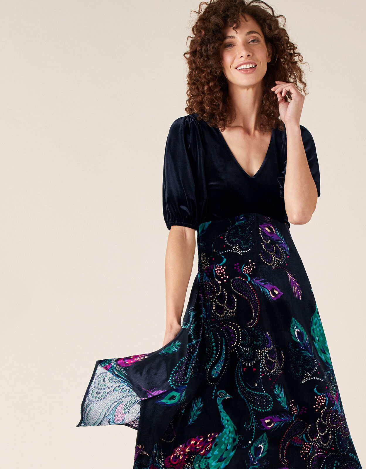 Persephone Peacock Print Hanky Hem Dress Black