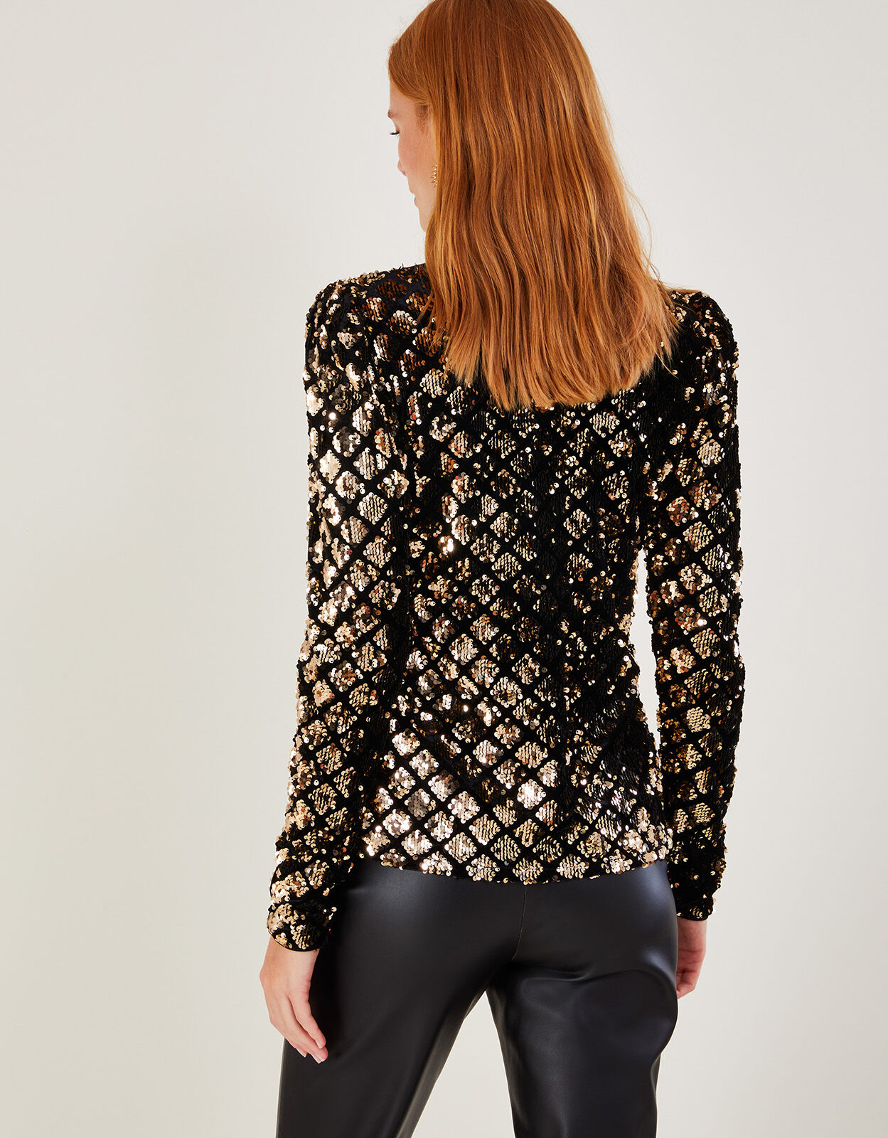 black top with gold sequins