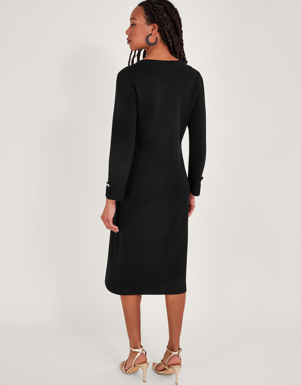 Black knit store dress with pockets