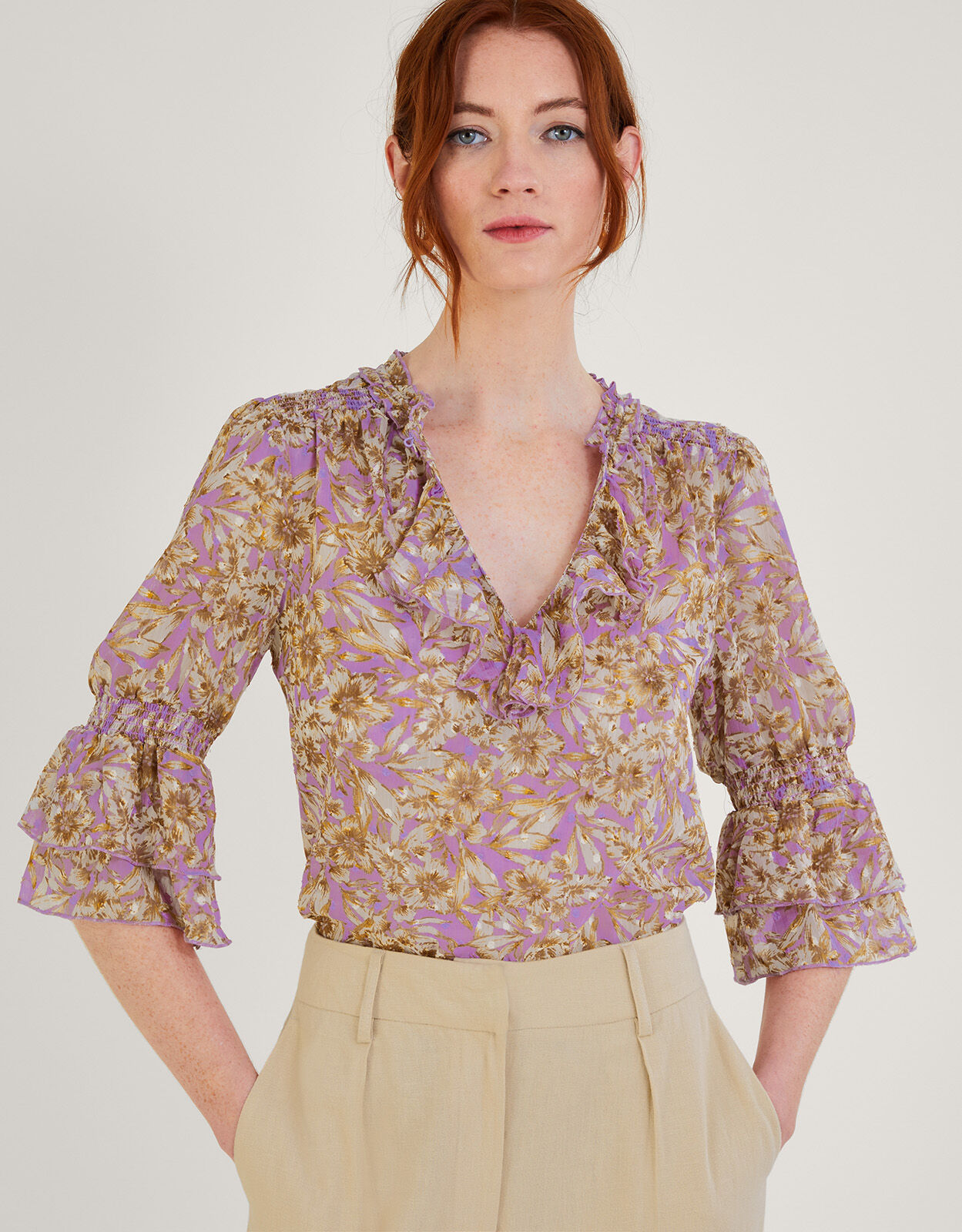 purple ruffle blouse