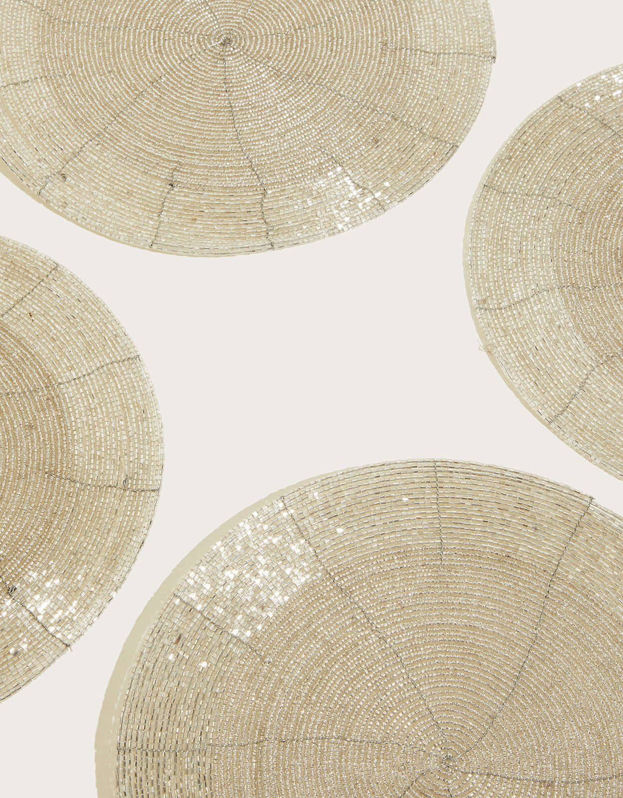Silver beaded table mats top