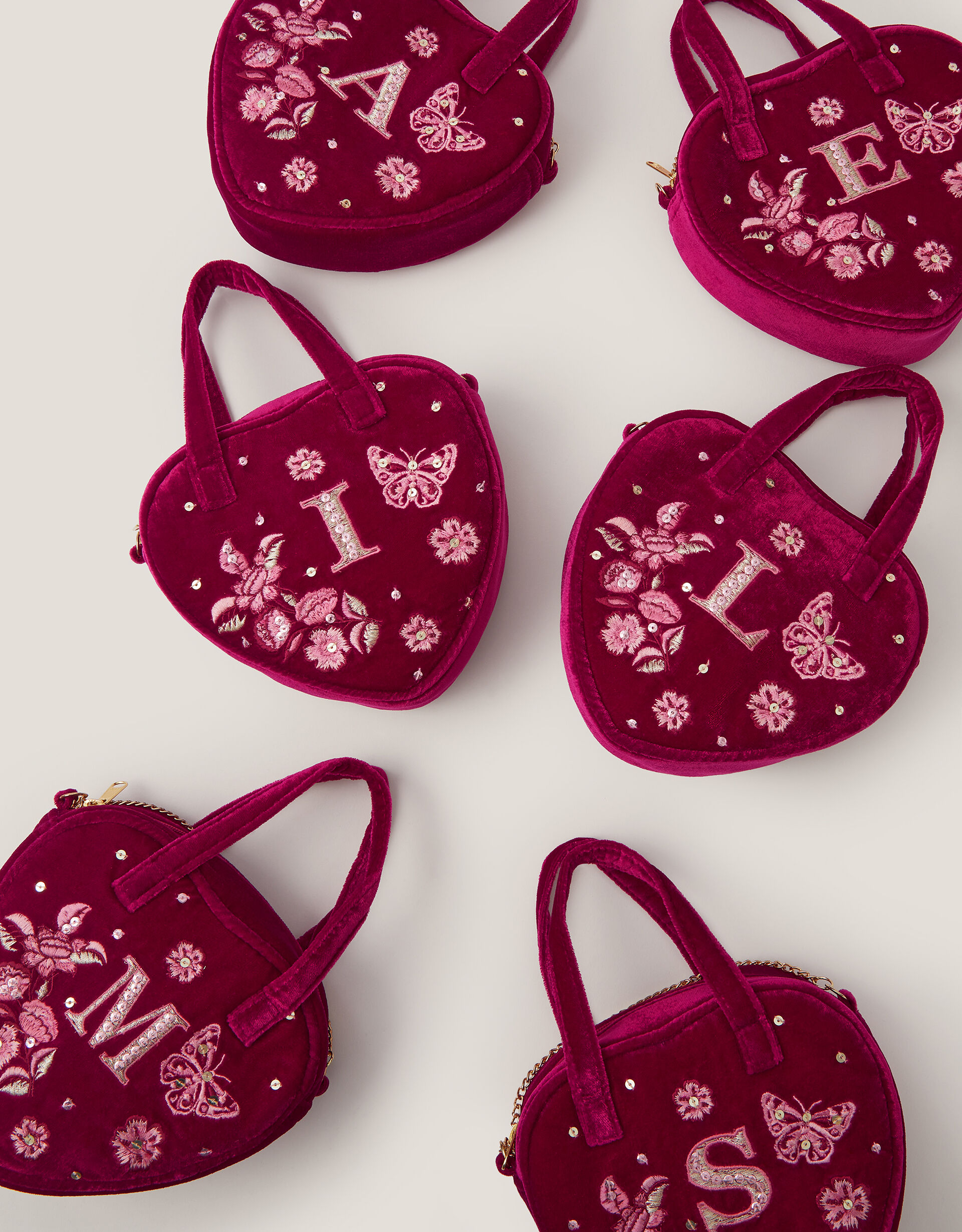 Embroidered Initial Heart Bag Red | Accessories | Monsoon UK.