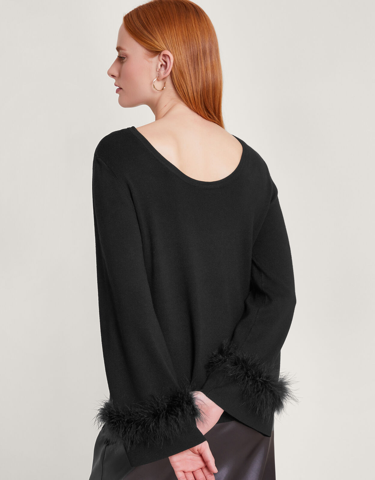 Black feather sweater store