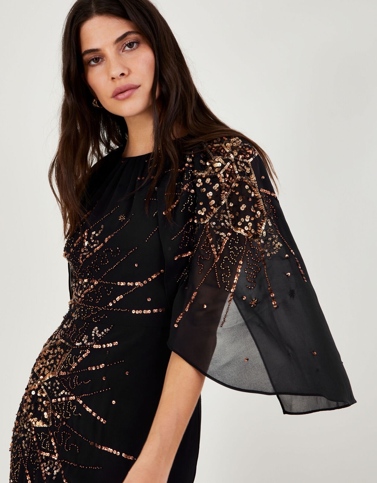 Black and gold cape dress online