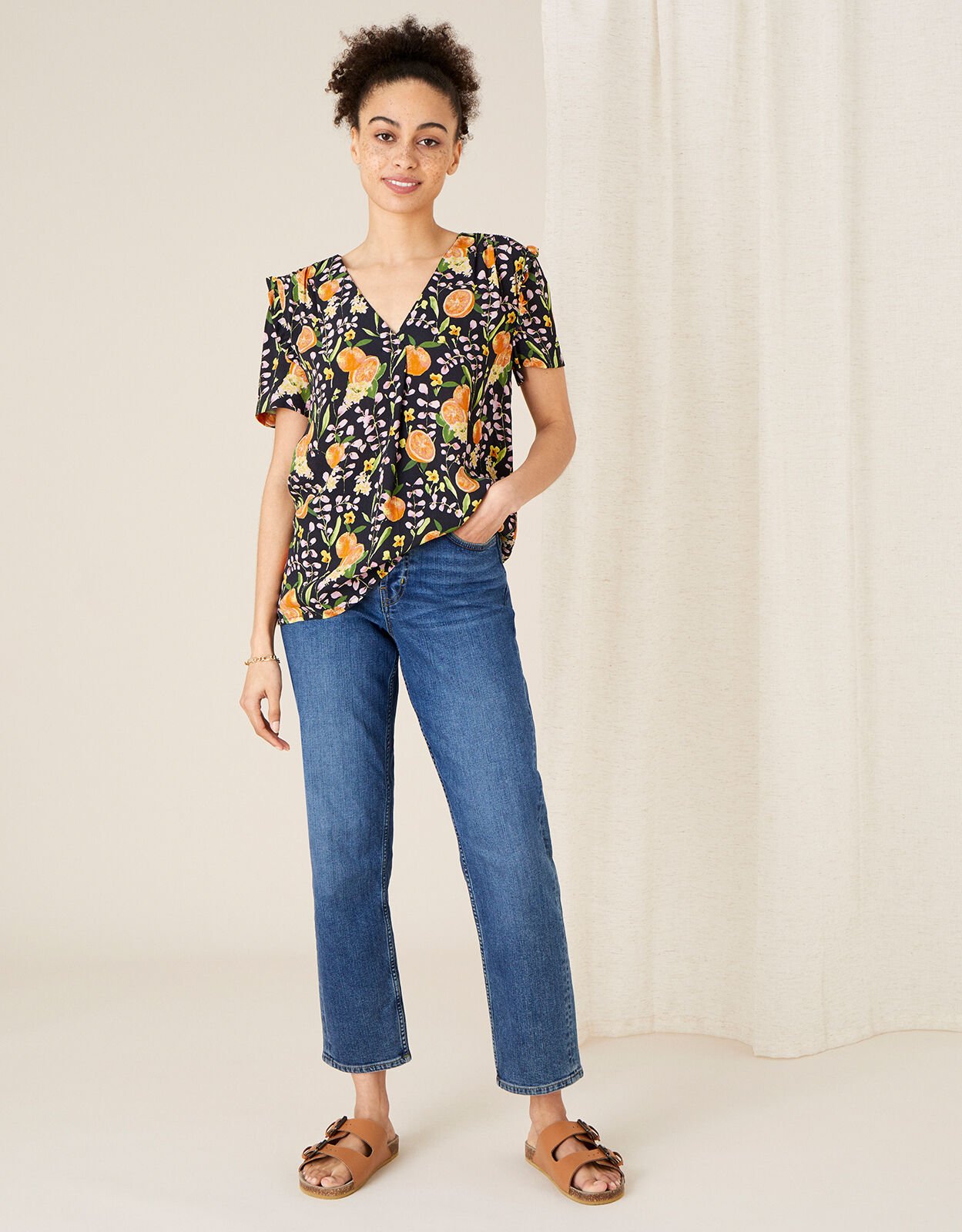 orange ruffle sleeve top
