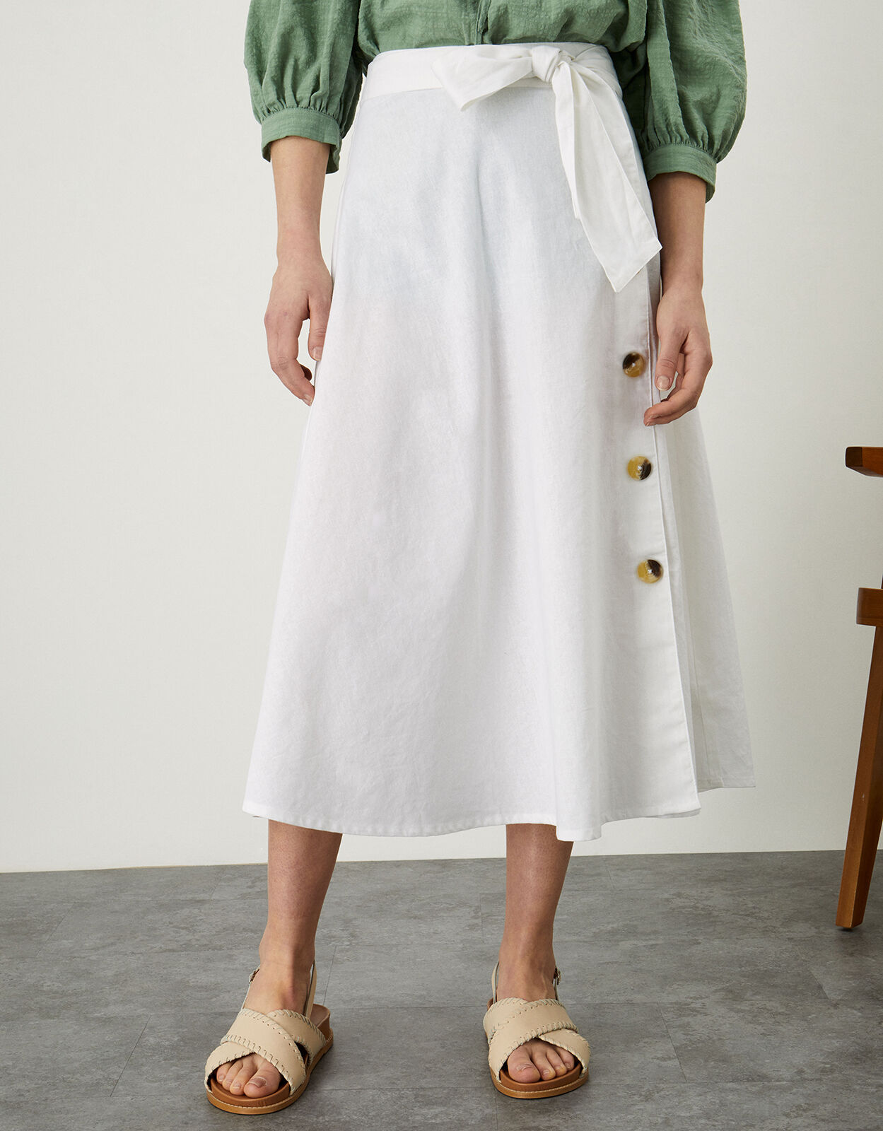 White midi skirt with buttons 2025