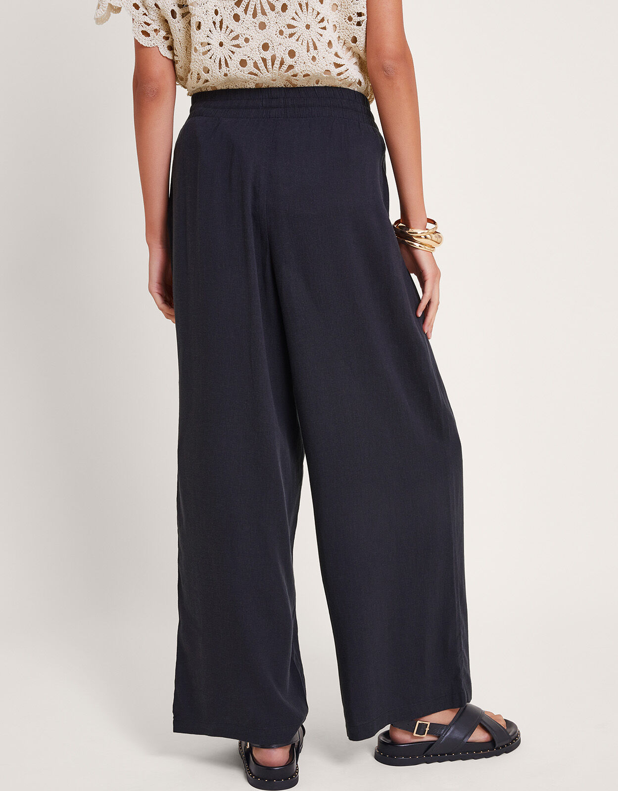 Black wide legged trousers top