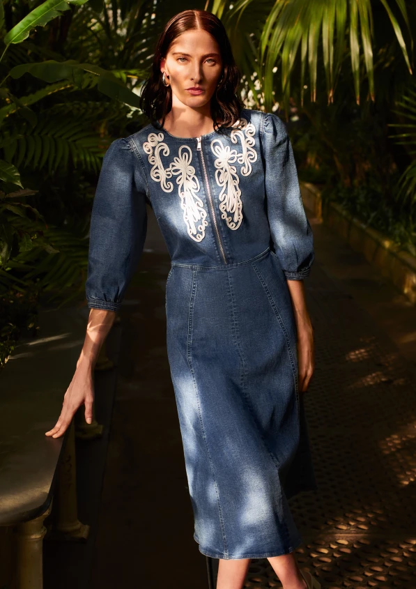 blue denim dress with white embroidery