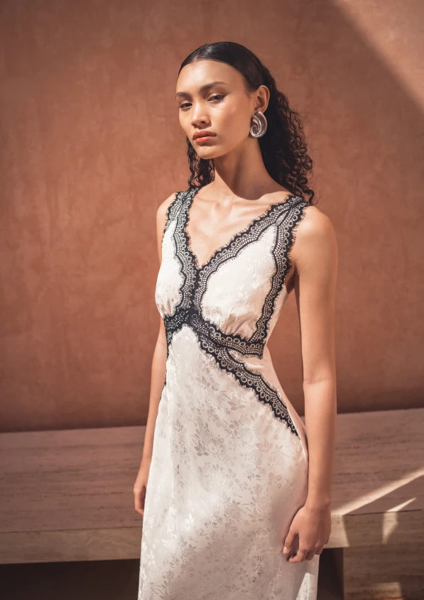 white dress with black lace trim